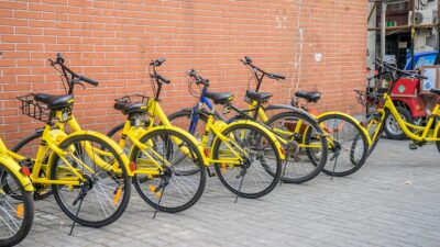 Flickr image of yellow bikes against a wall in China